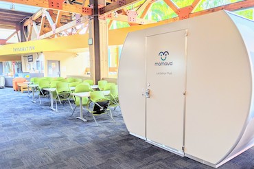 Picture of Mamava Lactation Pod located on the main floor of the UCEN next to the information desk.